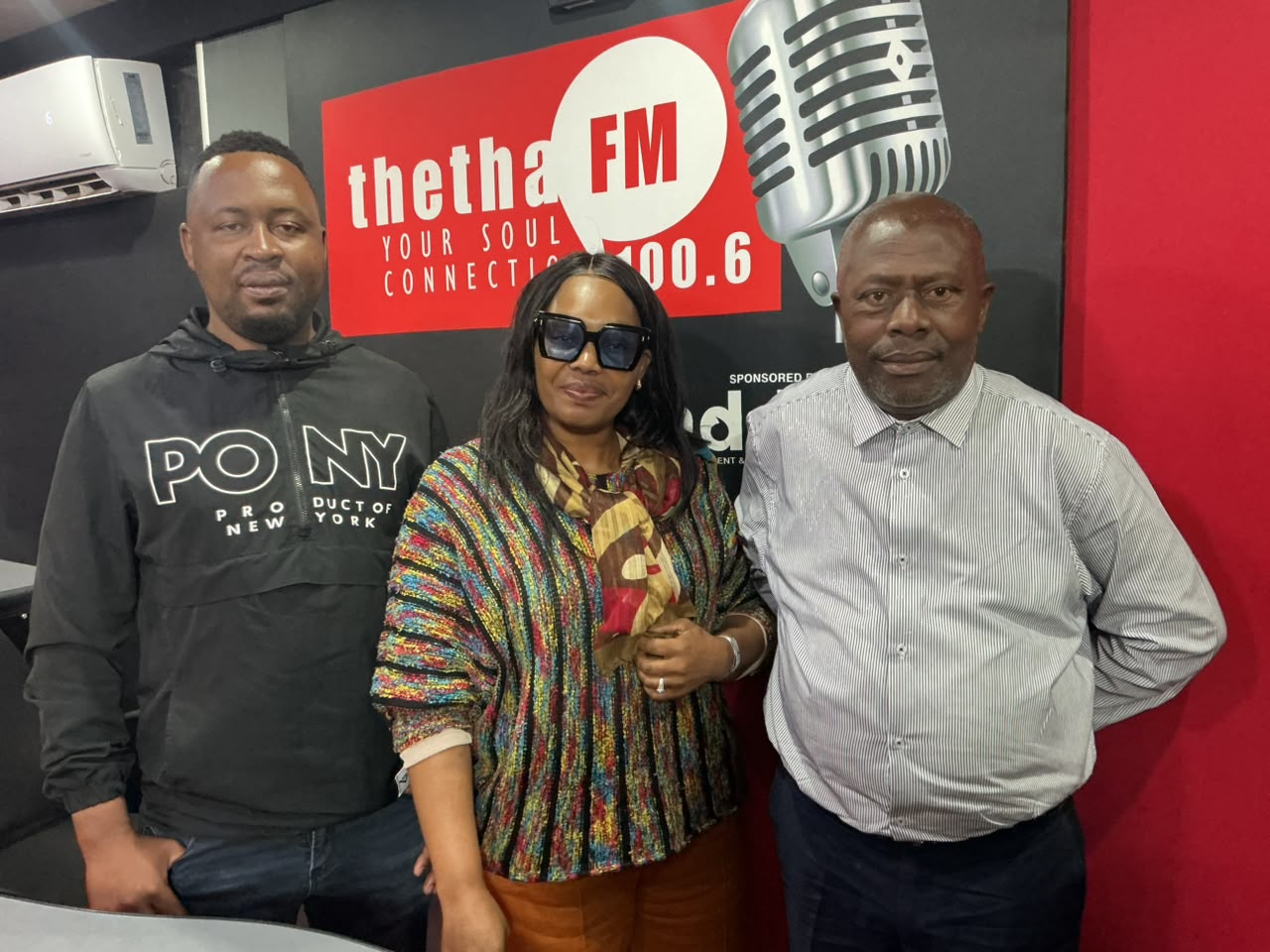 Forum leadership at a radio station studio